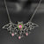 Mama Bat Pink & Green Antiqued Silvertone Necklace